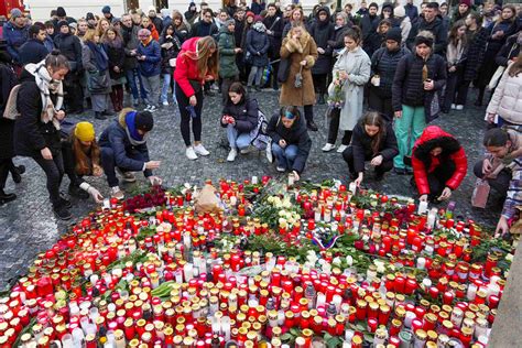 Police seek a motive as Prague mourns the 14 people killed in the nation’s worst mass shooting